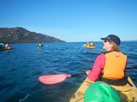 Kayaking in Coles Bay, Tasmania. Image credit: Brian Dodson